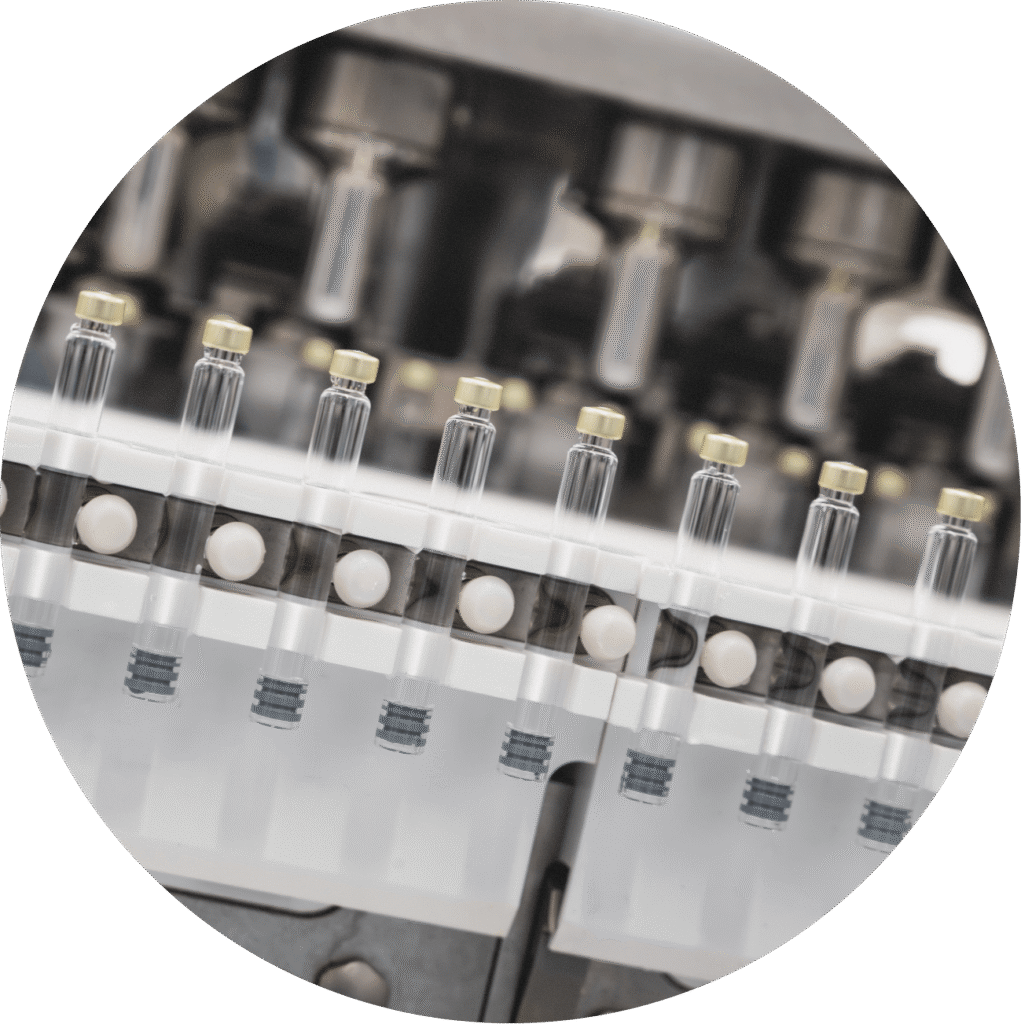 Close up image of vials on a filling line